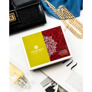 Wielokolorowy portfelik damski ze skóry naturalnej zamykany zatrzaskiem i suwakiem - Peterson